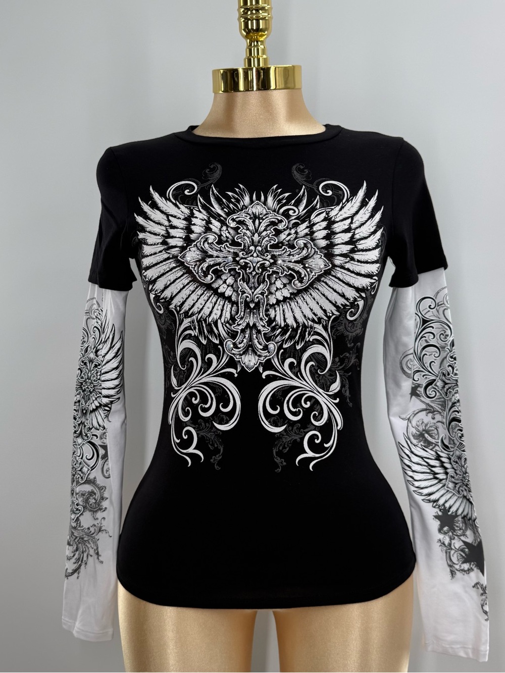 Black and white Y2K Rhinestone Winged Cross Faux Layered Top NWOT